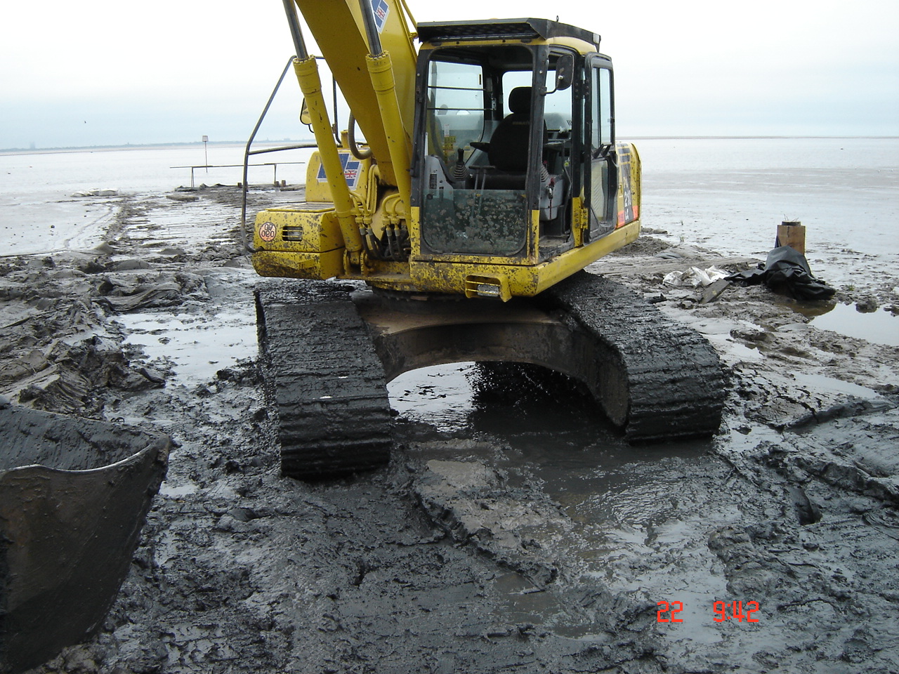 construction on muddy, unstable ground near a body of water
